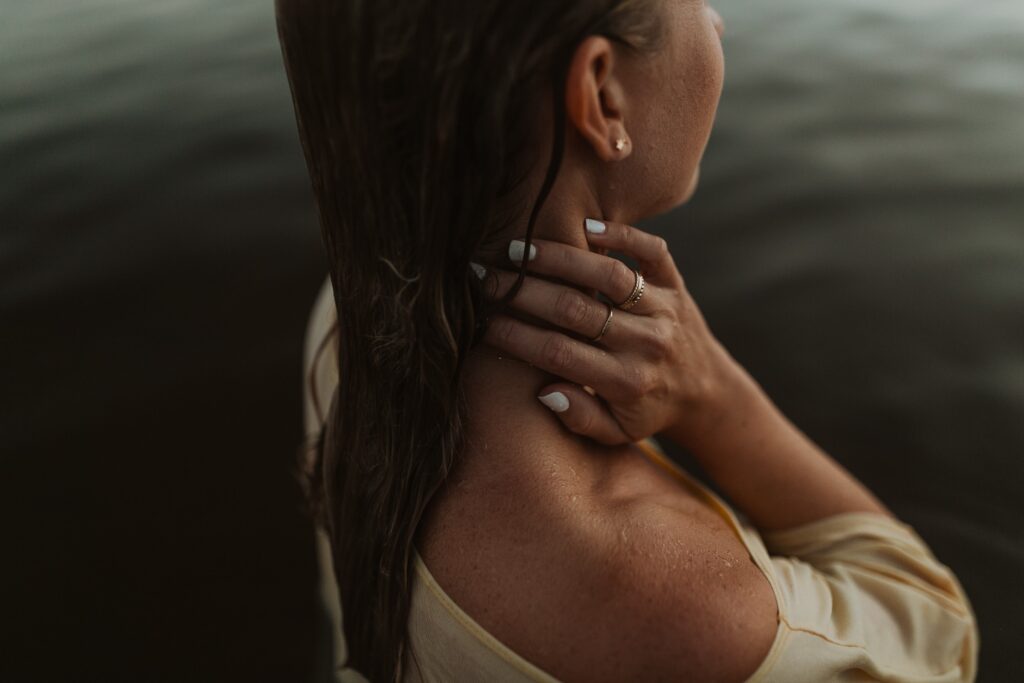 image of girl out of water with white nails