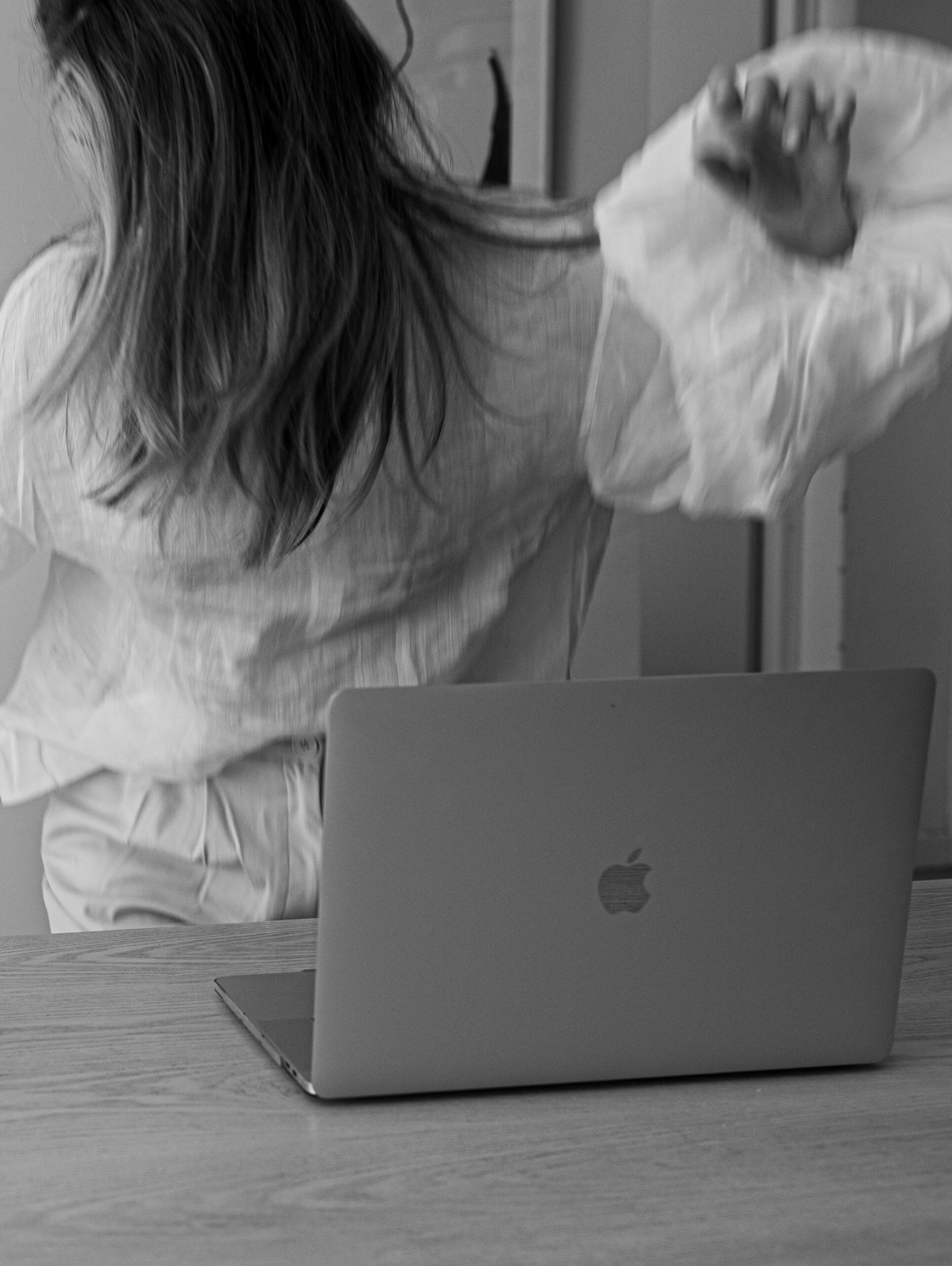 Image of girl by laptop